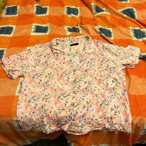 Cute tee blouse with a flowery design.